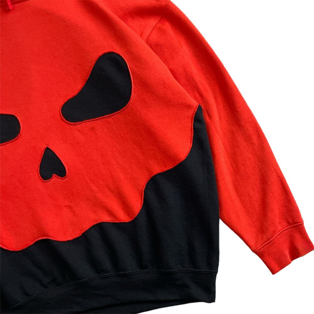 Red & Black Patchwork Hoodie with Demon Face Graphic