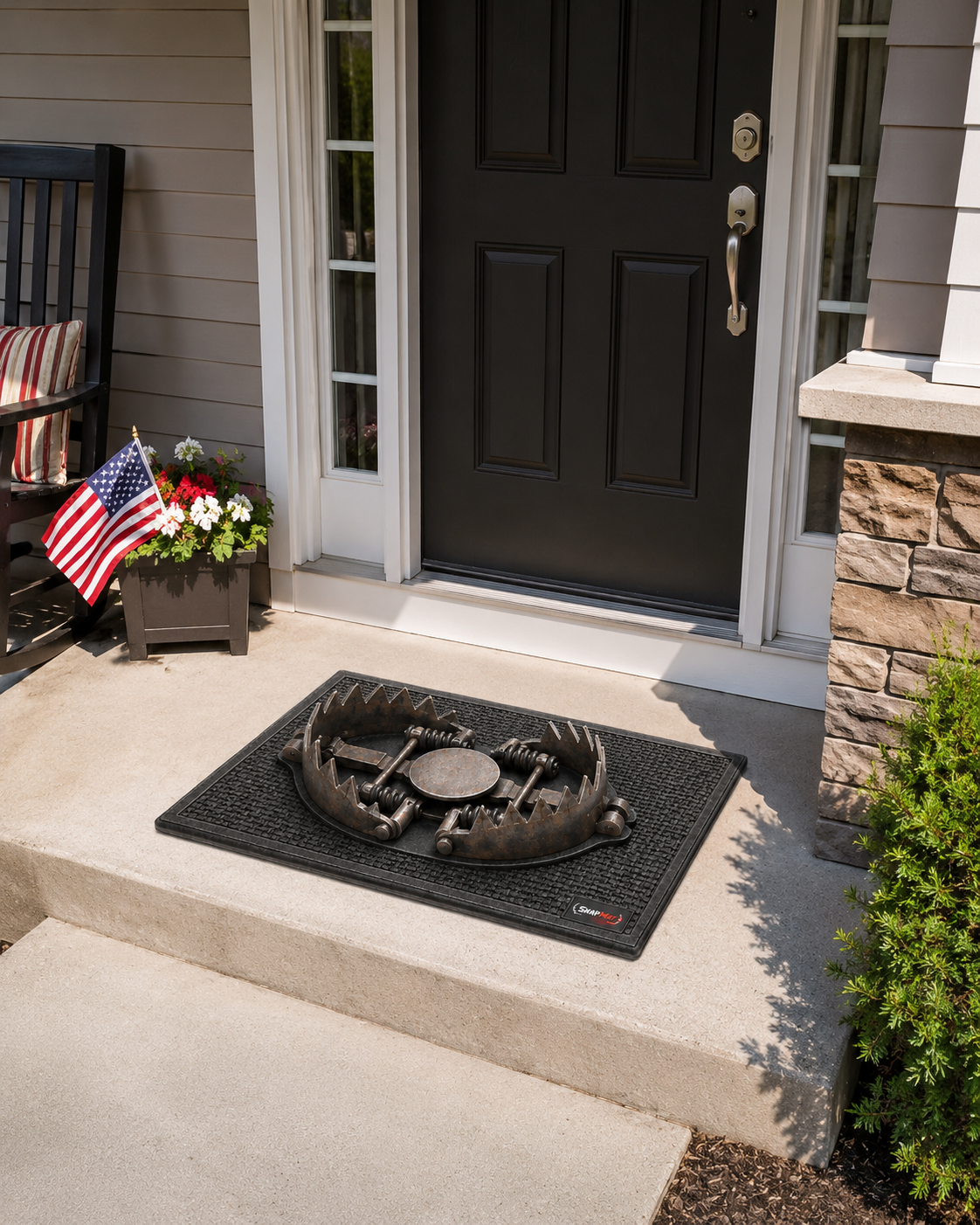 TrapStep Bear Trap Prank Doormat on a front porch