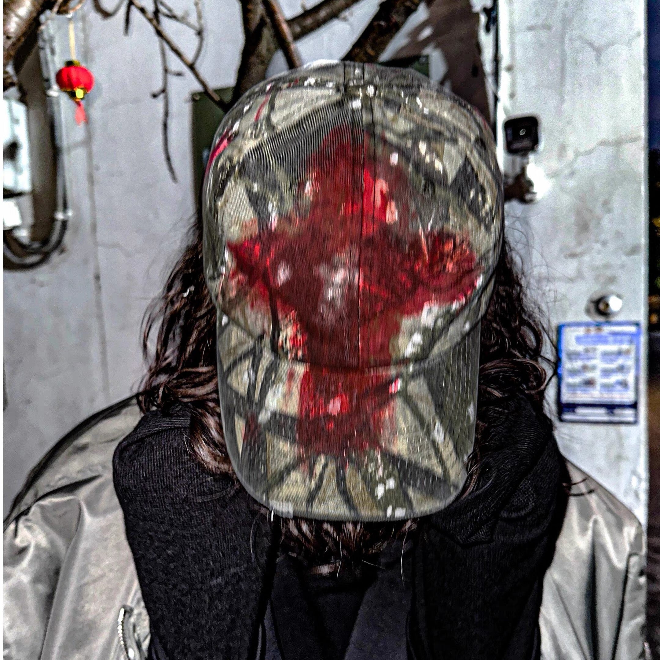 Distressed Camouflage Hat with Blood Splatter
