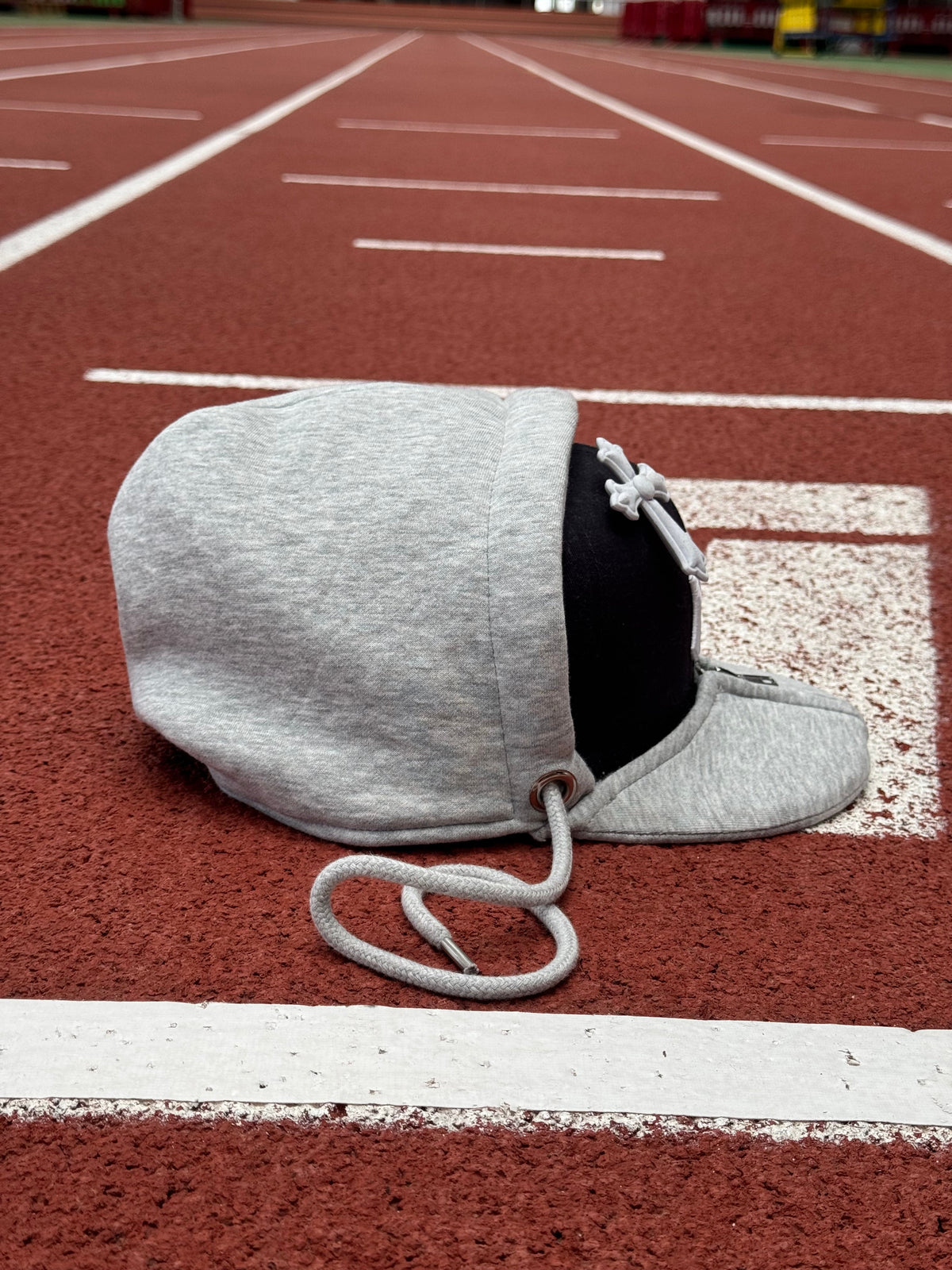 Snapback hat hoodie cover attachment side view